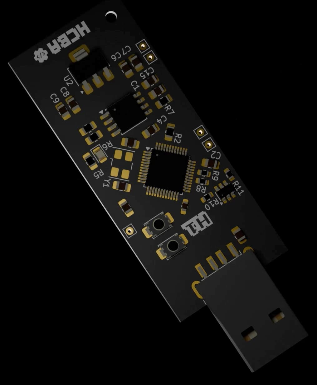The H1 development PCB, seen from above at an angle: a slim black board with a USB-A connector at one end, a square microcontroller in the middle, two tactile buttons, and gold-plated pads throughout.